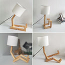 Companheiro de Luz – Luminária Articulada em Madeira